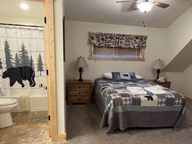 Master suite of a cabin at Three Rivers Resort and Outfitters in Gunnison, Colorado. Mountain Cabins. Non-Smoking. Full kitchens.