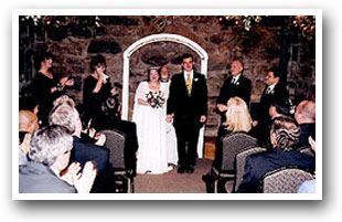 Colorado Wedding with newly married couple couple walking down the isle