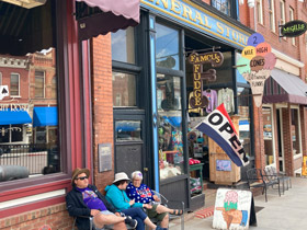 View of victorian store fronts along main street in downtown Cripple Creek, Colorado.