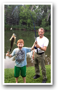 Grandpa and grandson fishing in Colorado