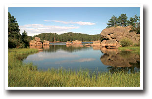 Calm still waters of Dowdy Lake in the Red Feather Lakes area of Colorado