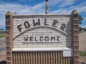 Brick welcome sign when entering Fowler, Colorado.