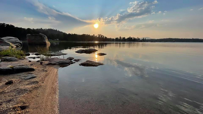 Sunset over Doudy Lake near Hill Top General Store, Cabins and Antiques in Red Feather Lakes, Colorado.