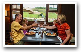 Family enjoying lunch at Granby Ranch Base, Colorado