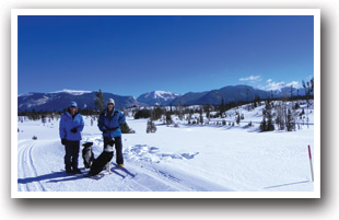 Snowshoe and Cross Country Skiers in Grand Lake, Rocky Mountain National Park, Colorado.