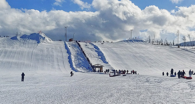 Huge tubing and sledding hill at Colorado Adventure Park near Winter Park in Fraser, Colorado