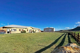 View of Ranch-Style vacation home rental at The Wild Horse Refuge and Vacation Home Rental in Craig, Colorado.